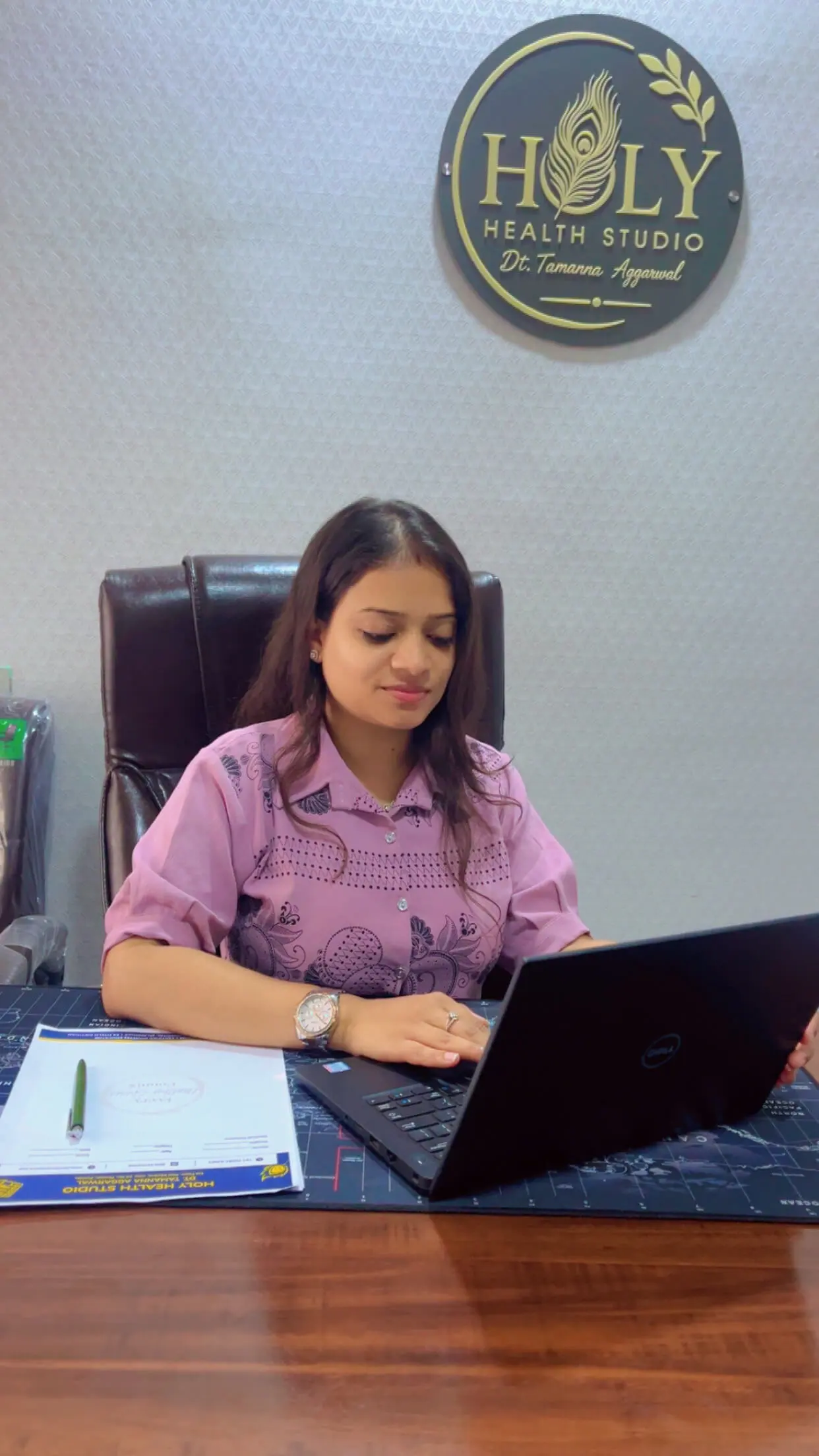A consultation desk with medical reports, a written diet plan and notes